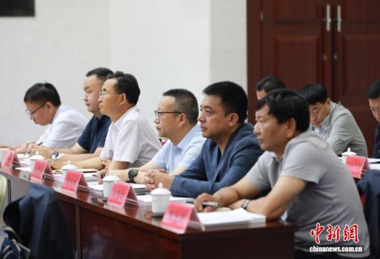 图为会议现场。胡贵龙摄